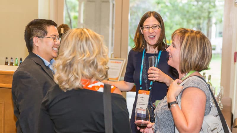 Marketers networking at an in-person conference